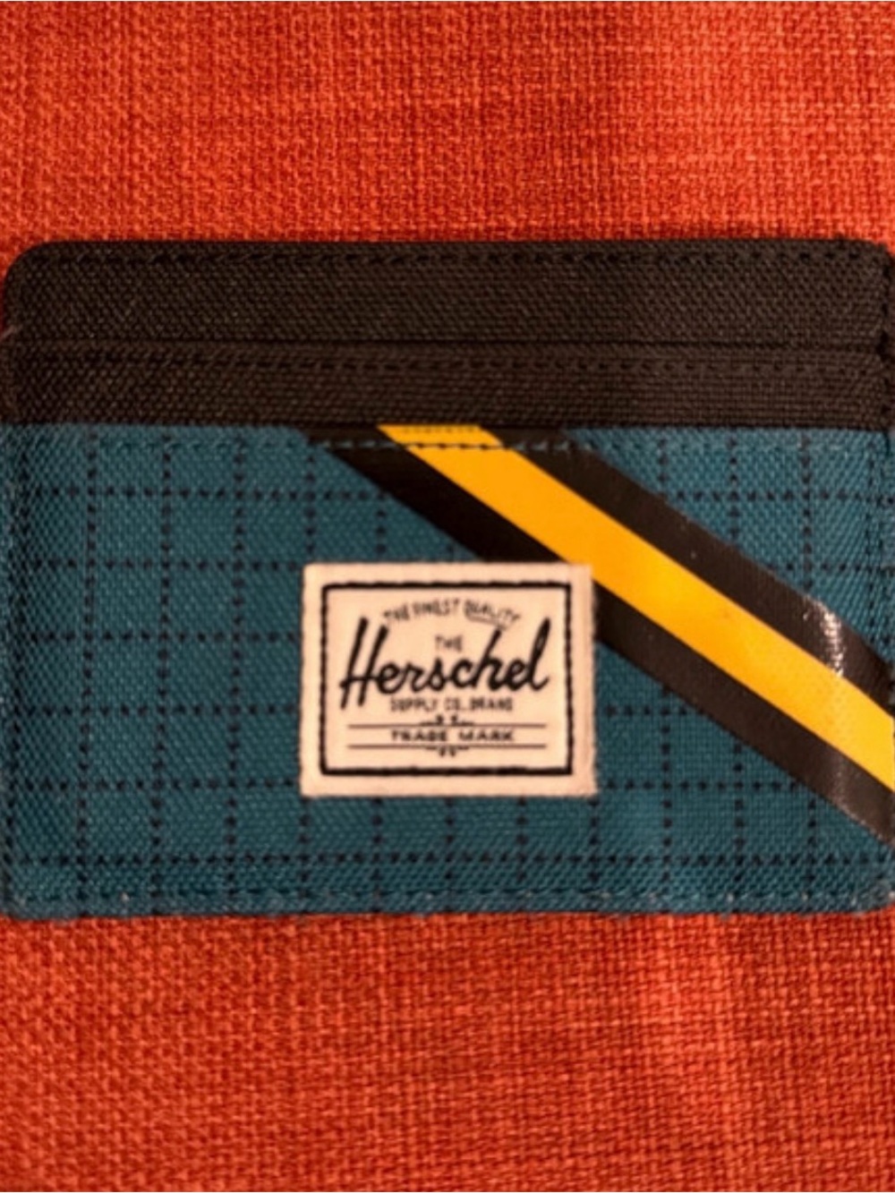 Herschel Supply Company Teal and Black Card Holder with Yellow Stripe